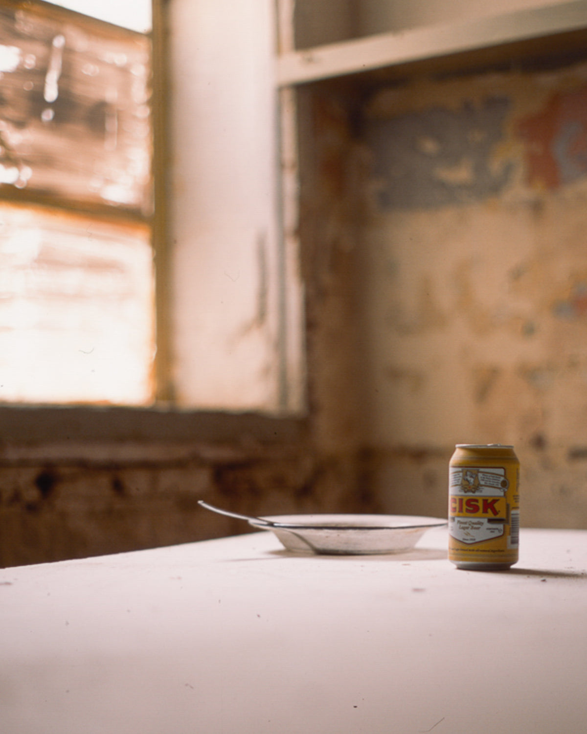 Cisk Larger in an abandoned room
